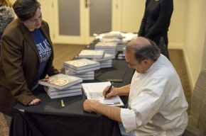  Stefano Manfredi signs copies of his new book New Pizza. Photo by Greg Jackson.